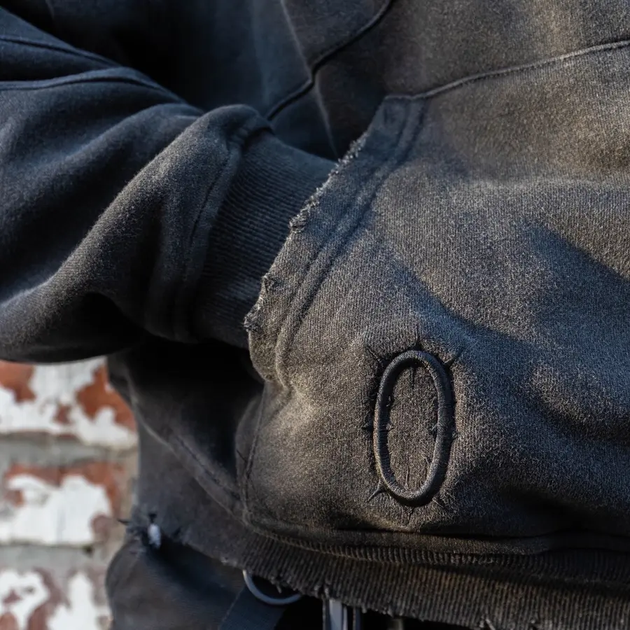 The Hollow crest stitched on a Revenant hoodie